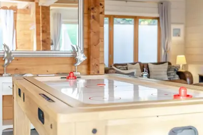 a kitchen with a center island in a living room at 3 Bed in Wadebridge oc-p00104 in Little Petherick