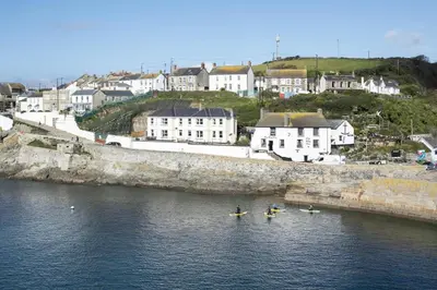 a group of people in kayaks in a body of water at 3 Bed in Porthleven oc-12bayv in Porthleven