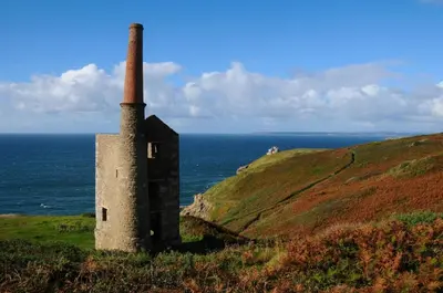 an old building on a hill next to the ocean at 1 Bed in Rinsey oc-1chapl in Praa Sands