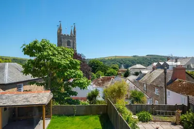 a view of a village with a church at 3 Bed in Fowey oc-1cobbs in Fowey