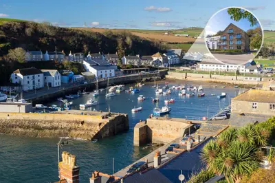 a view of a harbor with boats in the water at 2 Bed in Porthleven oc-1mont in Porthleven