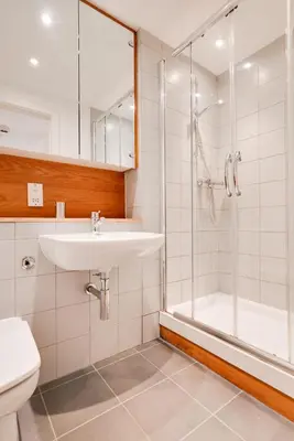 a bathroom with a sink and a shower and a toilet at 2 Bed in Porthleven oc-1mont in Porthleven