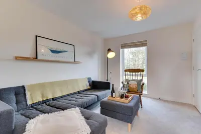 a living room with a couch and a chair at 2 Bed in St. Eval oc-boaths in Saint Ervan