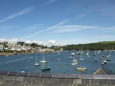 a bunch of boats floating on the water at 2 Bed in Fowey oc-ccgree in Fowey