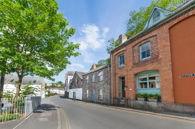 an empty street in a town with brick buildings at 2 Bed in Fowey oc-ccoun2 in Fowey