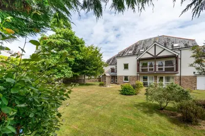 an exterior view of a house with a yard at 2 Bed in Carlyon Bay oc-crinni in Carlyon Bay
