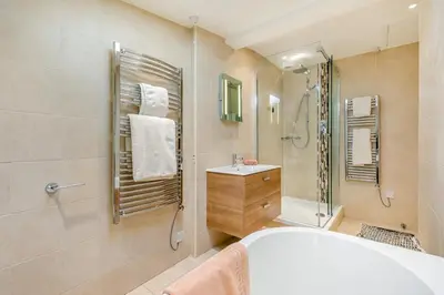 a bathroom with a shower and a sink at 3 Bed in Helford oc-dowrpe in Helford