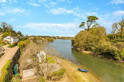 a view of a river with a boat on it at 3 Bed in Helford oc-hcwedn in Helford