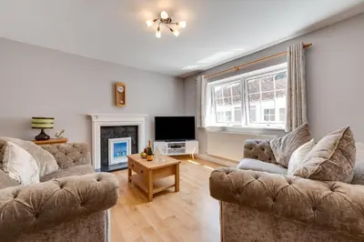 a living room with two couches and a tv at 2 Bed in Fowey oc-jackda in Fowey