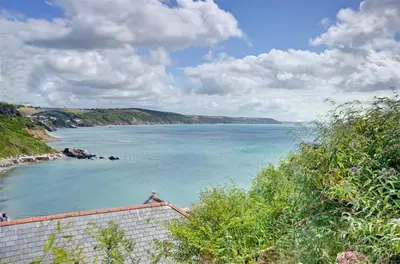 a view of a body of water from a hill at 2 Bed in Looe oc-l10082 in Looe