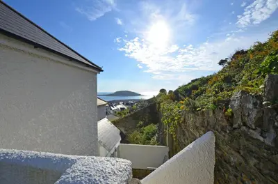 a view of the ocean from the balcony of a house at 1 Bed in Looe oc-l30008 in Looe