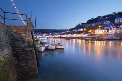 a harbor with boats in the water at night at 2 Bed in Looe oc-l30035 in Looe