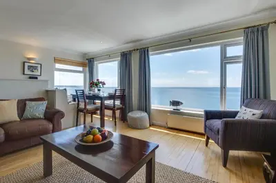 a living room with a view of the ocean at 2 Bed in Porthleven oc-lampho in Porthleven