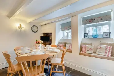 a dining room with a table and chairs at 3 Bed in Looe oc-l30053 in Looe