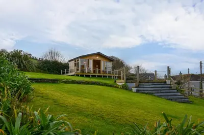 a small house on top of a grassy hill at 3 Bed in Mevagissey oc-windru in Mevagissey