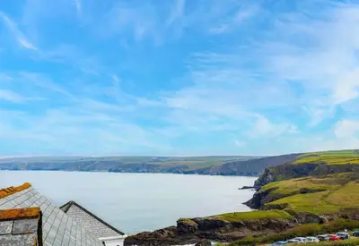 a view of a body of water from a house at Number 9, Port Isaac Bay Holidays in Port Isaac