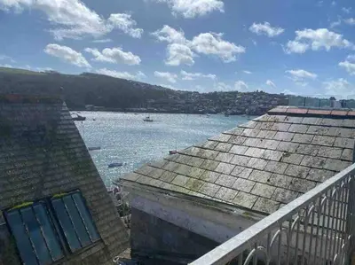 a view of a body of water from a building at The Captain’s 4 Bed Penthouse in Fowey