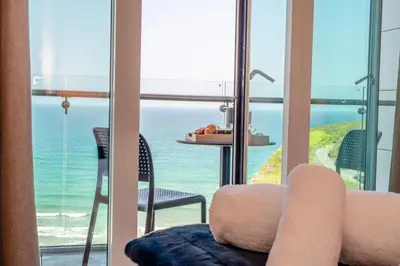 a living room with a view of the ocean at 3 Bed in Newquay oc-mordh in Newquay