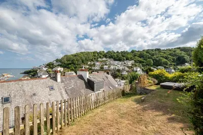 a view of a village from a fence at 2 Bed in Looe oc-msweet in Looe