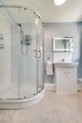 a bathroom with a shower and a sink at 2 Bed in Looe oc-msweet in Looe