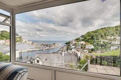 a view of the water from a room with a window at 2 Bed in Looe oc-msweet in Looe
