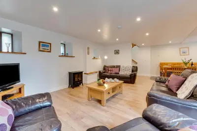 a living room with two couches and a tv at 1 Bed in St. Merryn oc-nel42 in St Merryn