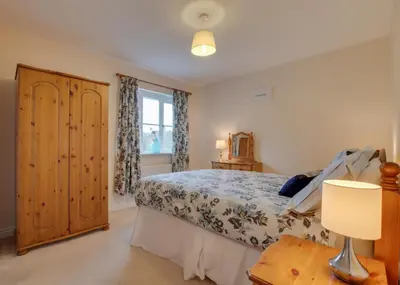 a bedroom with a bed and a window at 3 Bed in Wadebridge oc-p00093 in Wadebridge