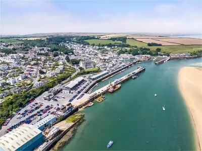 an aerial view of a harbor with boats in the water at 4 Bed in Padstow oc-p00184 in Padstow