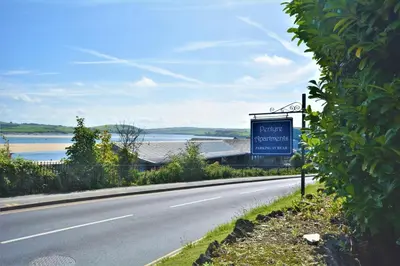 a sign on the side of a road at 2 Bed in Padstow oc-p00134 in Padstow