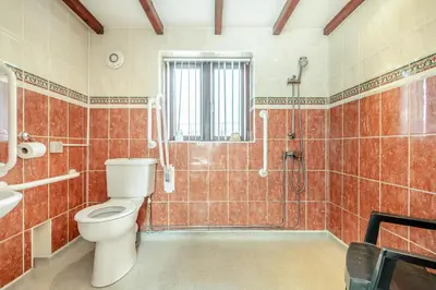 a bathroom with a toilet and a shower at 2 Bed in Padstow oc-p00249 in Padstow