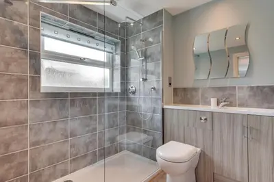 a bathroom with a shower and a toilet and a sink at 3 Bed in St. Merryn oc-p00251 in St Merryn