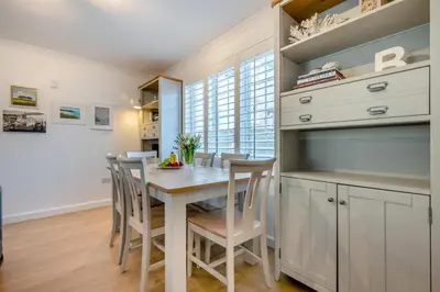 a kitchen and dining room with a table and chairs at 3 Bed in Padstow oc-p00165 in Padstow