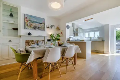 a kitchen and dining room with a table and chairs at 3 Bed in Padstow oc-p00144 in Padstow