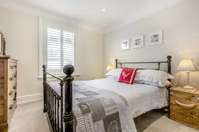 a bedroom with a bed and a window at 3 Bed in Padstow oc-p00329 in Padstow