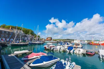 a bunch of boats docked in a marina at 1 Bed in Padstow oc-p00288 in St Merryn