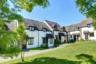 an exterior view of a house with a yard at 2 Bed in Padstow oc-p00330 in Padstow