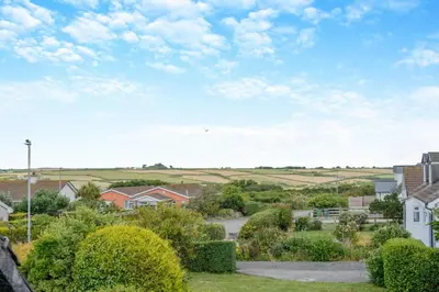 a view of a residential neighbourhood with houses at 2 Bed in Padstow oc-p00398 in St Merryn
