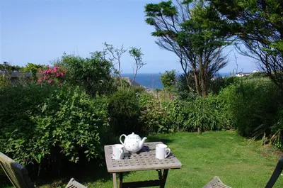a table with a tea set on top of it at 2 Bed in Newquay oc-p00359 in Mawgan Porth