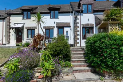a house with some plants in front of it at 2 Bed in Padstow oc-p00390 in Padstow