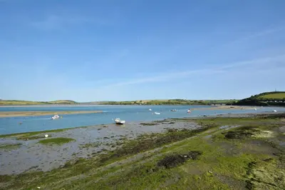 a large body of water with boats in it at 3 Bed in Wadebridge oc-p00421 in Saint Issey