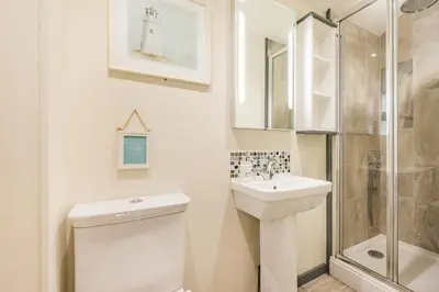a bathroom with a toilet and a sink and a shower at 3 Bed in Bodmin oc-p00437 in Bodmin