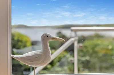 a plastic bird sitting on a window sill at 3 Bed in Padstow oc-p00418 in Padstow