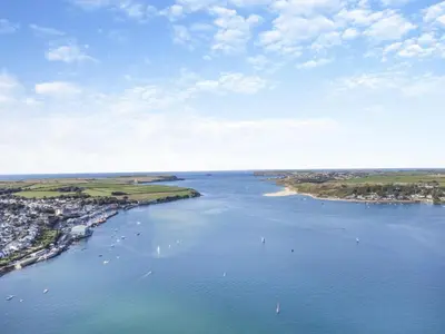 an aerial view of a body of water with boats at 3 Bed in Padstow oc-p00418 in Padstow
