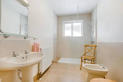 a bathroom with a sink and a toilet at 1 Bed in Padstow oc-p00485 in St Merryn