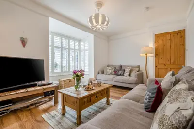 a living room with a couch and a tv at 3 Bed in Padstow oc-p00455 in Padstow