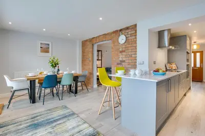 a kitchen and dining room with a table and chairs at 3 Bed in Padstow oc-p00504 in Padstow