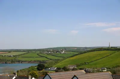 a view of a town with a river and green fields at 2 Bed in Padstow oc-p00531 in Padstow