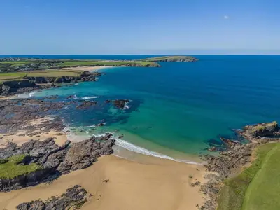 an aerial view of a beach and the ocean at 3 Bed in St. Merryn oc-p00569 in St Merryn