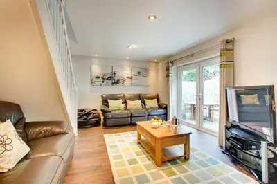 a living room with a couch and a tv at 3 Bed in St. Merryn oc-p00569 in St Merryn
