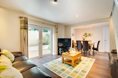 a living room with a couch and a table at 3 Bed in St. Merryn oc-p00569 in St Merryn